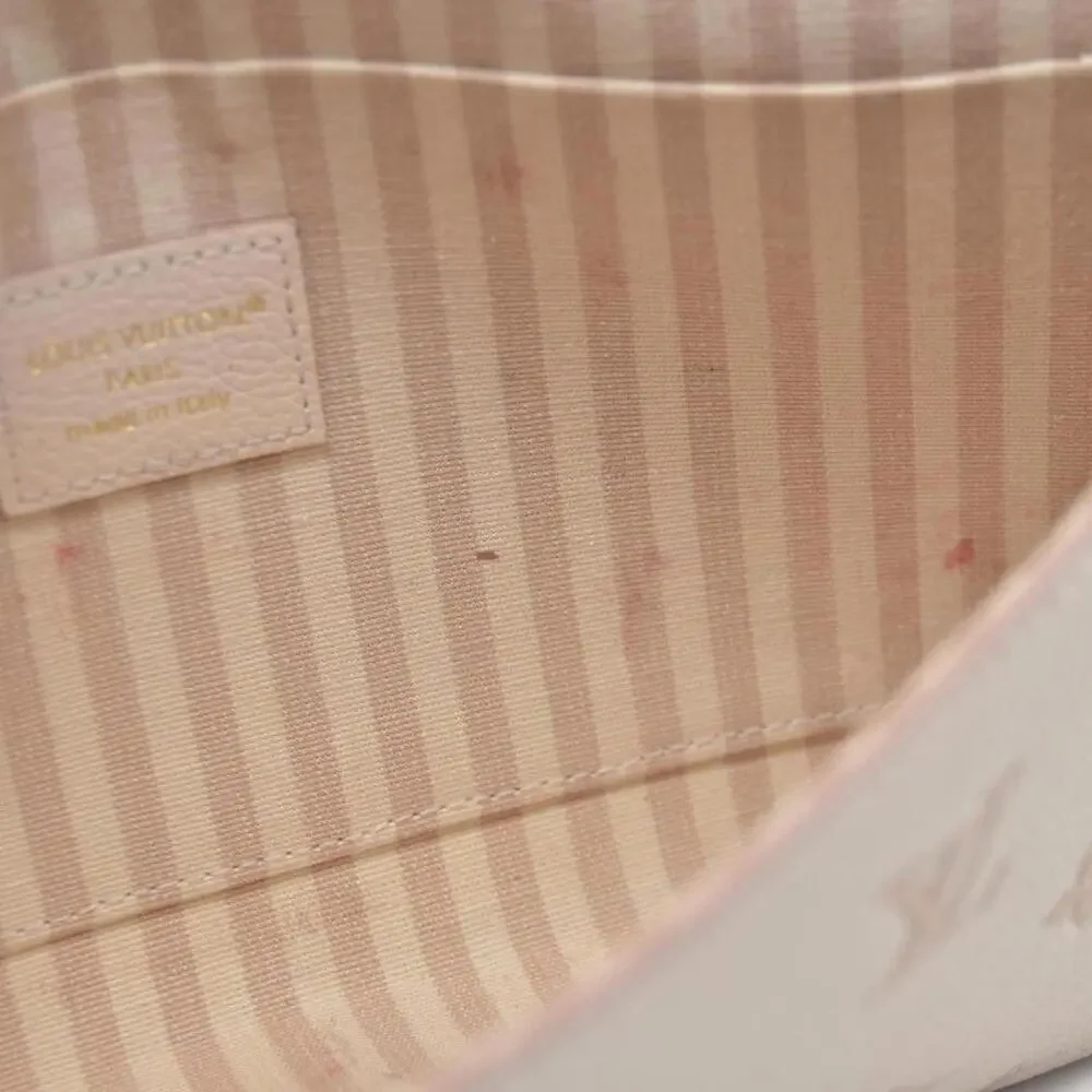 Louis Vuitton House's signature Monogram Pochette Felicie